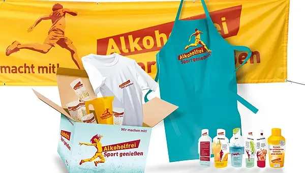Die Aktionsbox mit Aktionsbanner, Barschürze und Cocktail-Heft.
